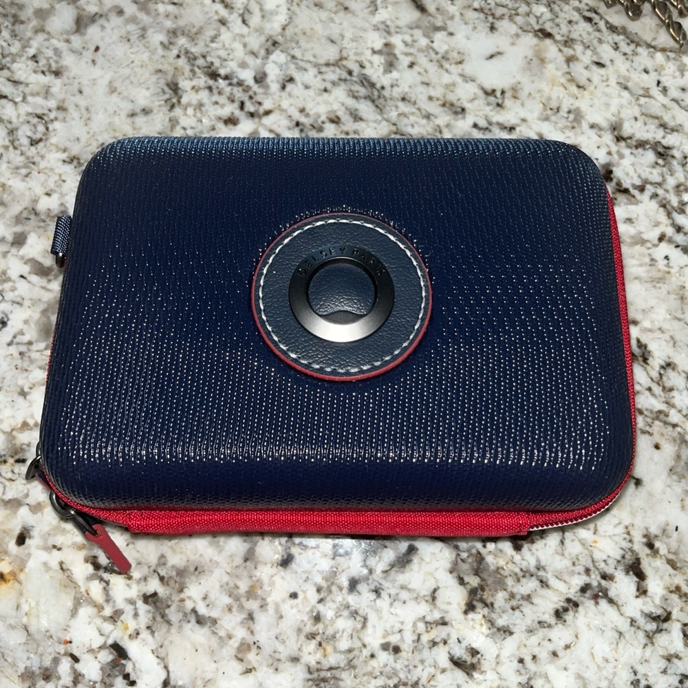 Delsey Paris Navy and Red Hard Shell Crossbody